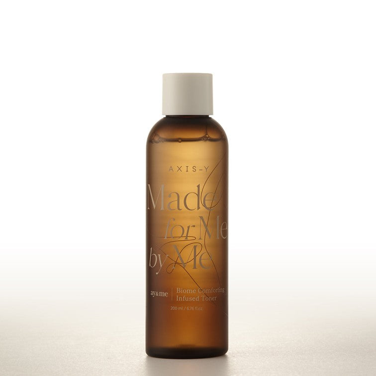 Brown bottle with white cap labeled 'Made for Me by Me' on a white background