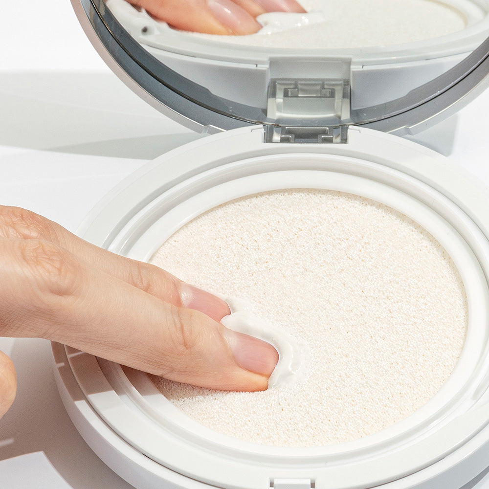 Vegan sun cushion with SPF 50+ PA++++, niacinamide, and hydrating ingredients for brightening and UV protection without white cast