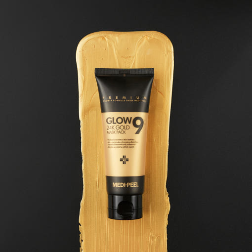 Tube of Glow 9 24K Gold Mask Pack on a gold background