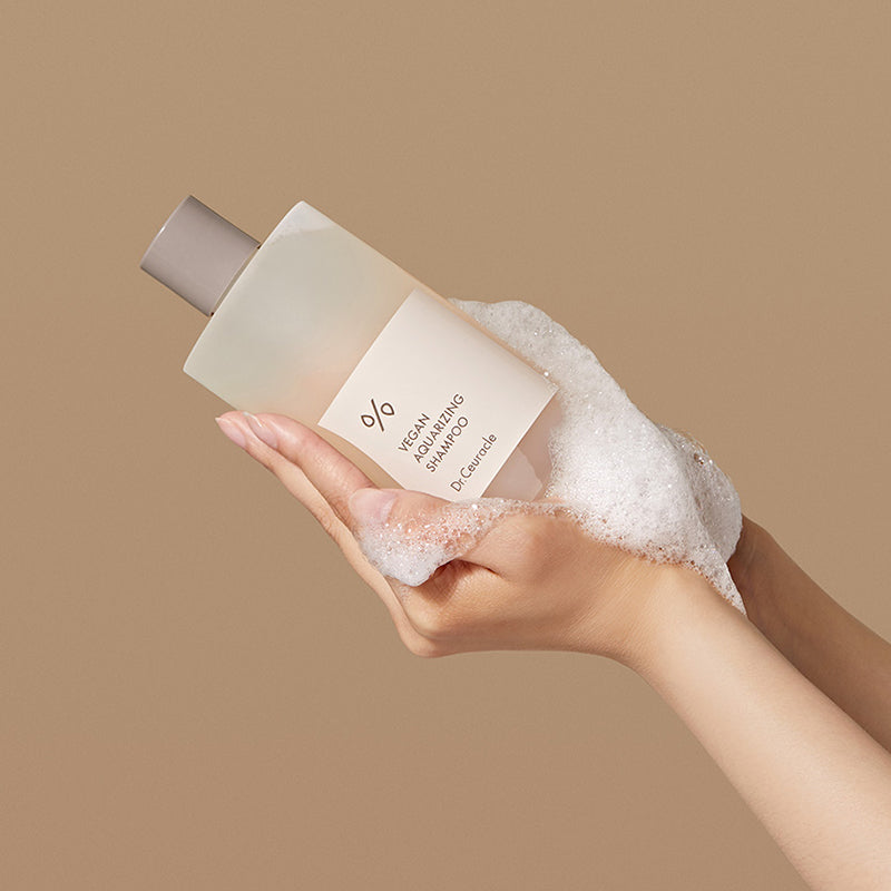 Dr. Ceuracle Vegan Aquarizing Shampoo bottle; hydrating vegan formula for dry, damaged hair and sensitive scalps