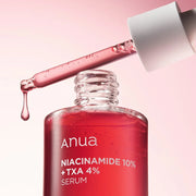Anua Niacinamide 10% + TXA 4% dark spot correcting serum, a Korean skincare product to brighten and hydrate skin while reducing pigmentation.
