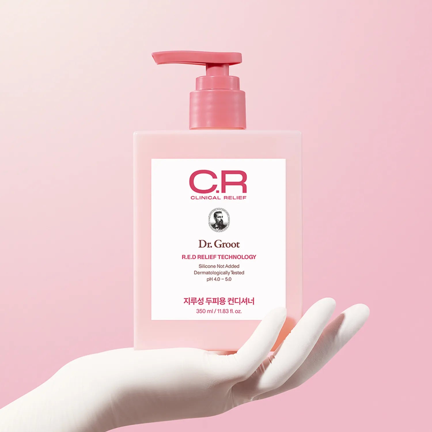 Dr. Groot bottle with pink pump on a pink background