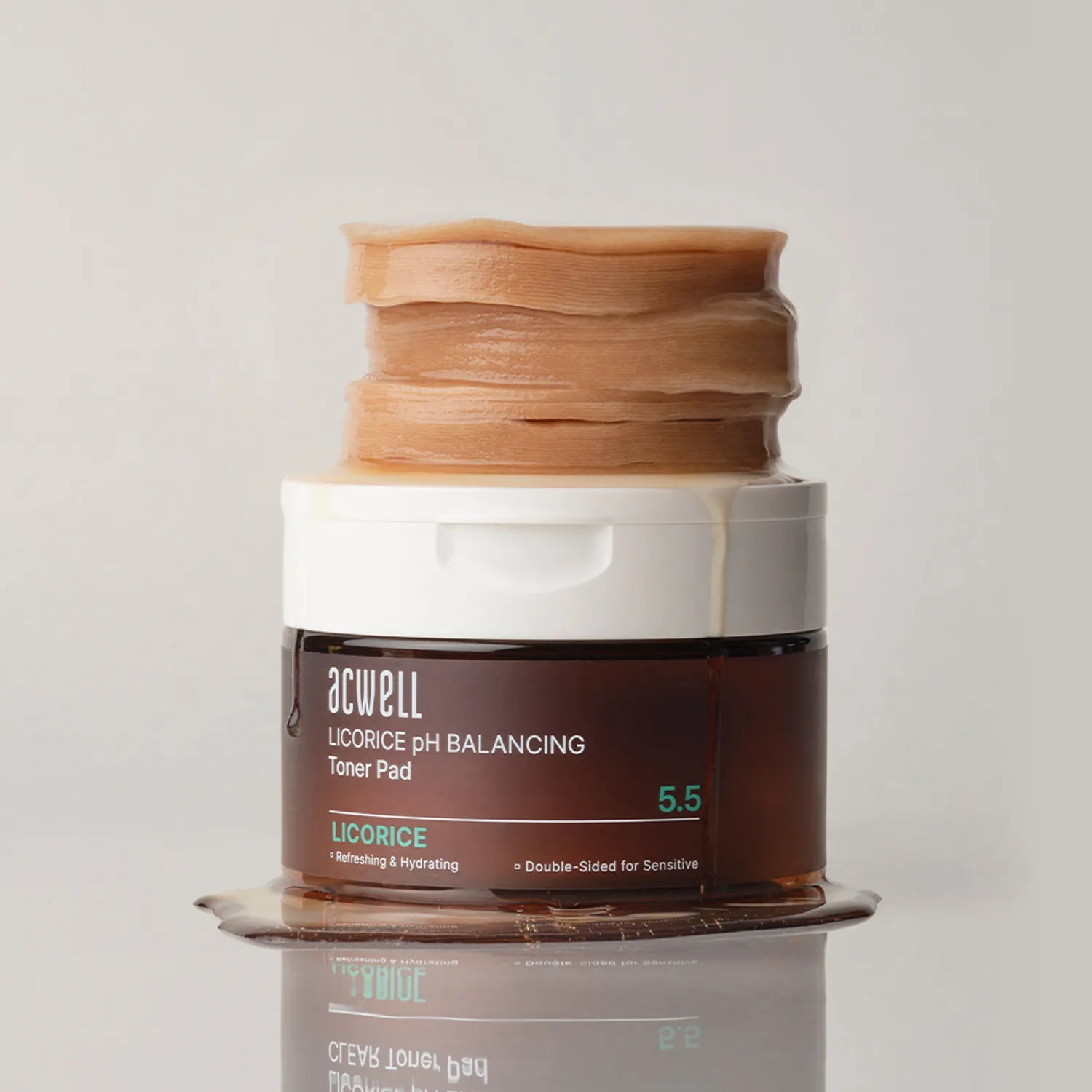 Acwell Licorice pH Balancing Toner Pads in a sealed tub with pre-soaked cotton rounds