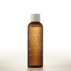 Brown bottle with white cap labeled 'Made for Me by Me' on a white background