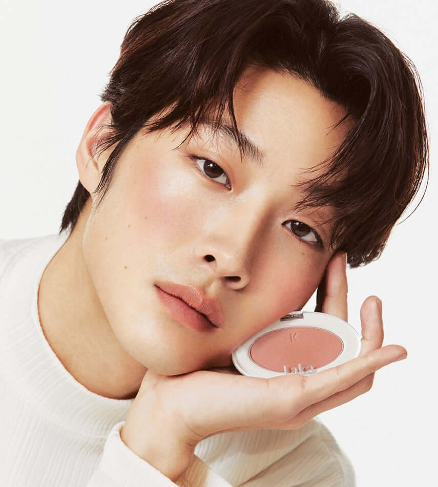 Model showcasing Laka Love Silk Blush in warm pink and purple tones for a radiant complexion.