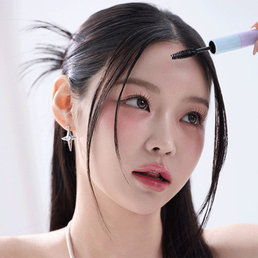 Daleaf Dual Fix Hair Mascara wand with dual brushes and clear gel.