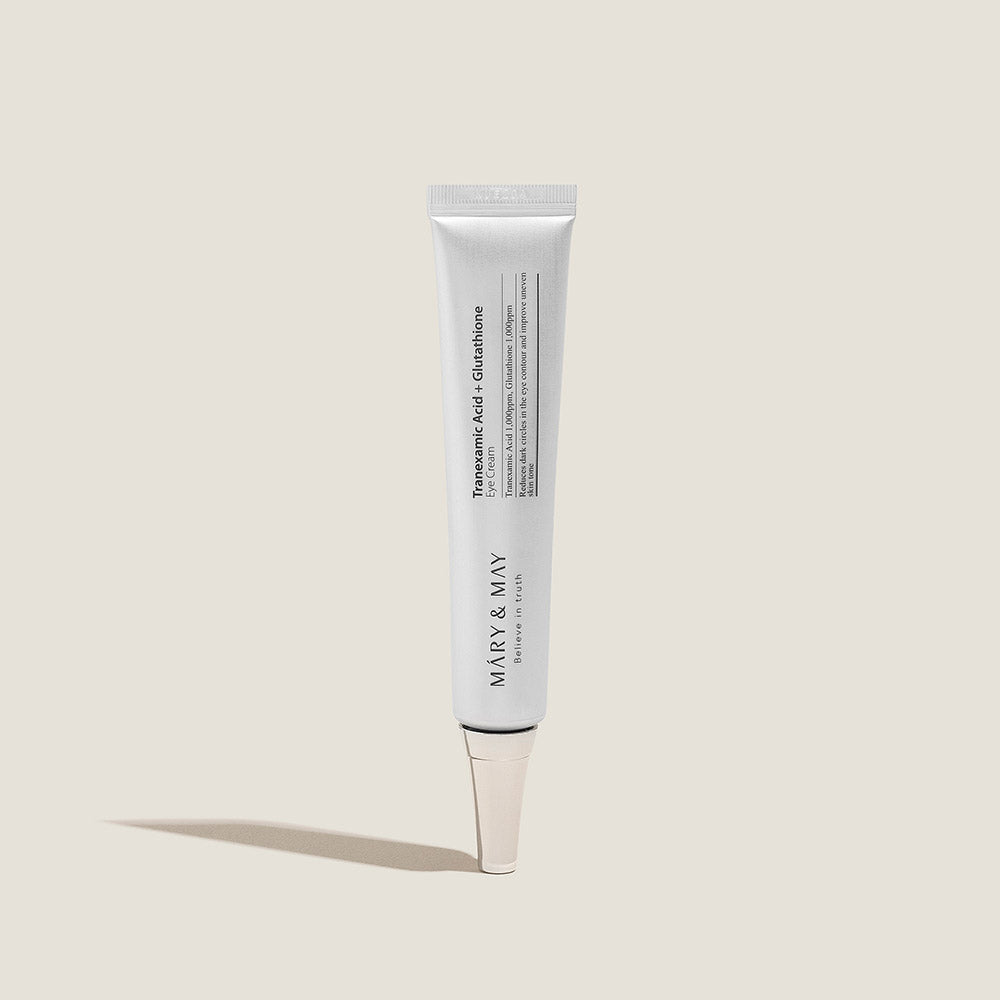Skincare tube with silver cap on white background