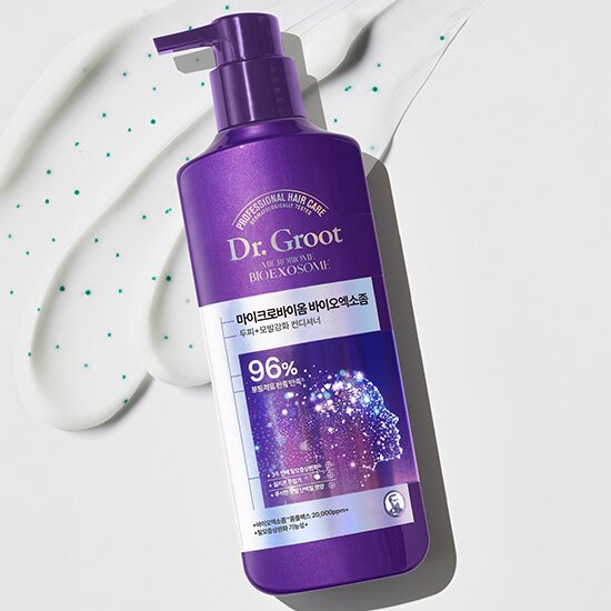A bottle of Dr.Groot Bio Exosome Scalp Hair Loss Total Care Conditioner with a purple label and pump dispenser.