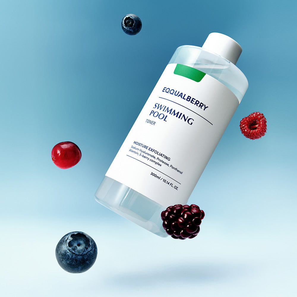 Bottle of Equalberry Swimming Pool Toner with berries on a blue background