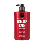 Tall red bottle of Mise en Scène Damage Care Red Protein Shampoo with floral design