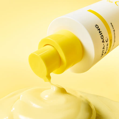 Vita-Aging Pure C Cream bottle with yellow cap on a white background